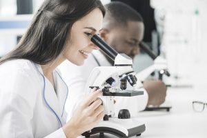 Cheerful Woman in Laboratory
